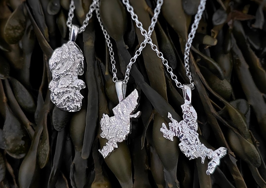 3 silver necklaces shaped like islands of scotland